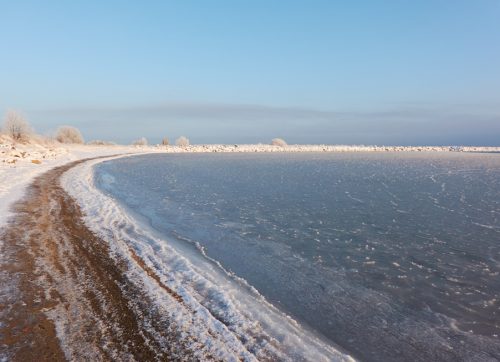 a,view,from,the,frozen,snow covered,baltic,sea,shore.,cloudy