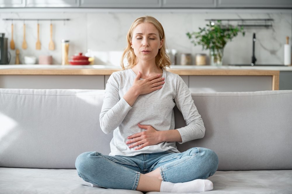 concept,of,mental,health.,woman,sitting,on,couch,and,doing