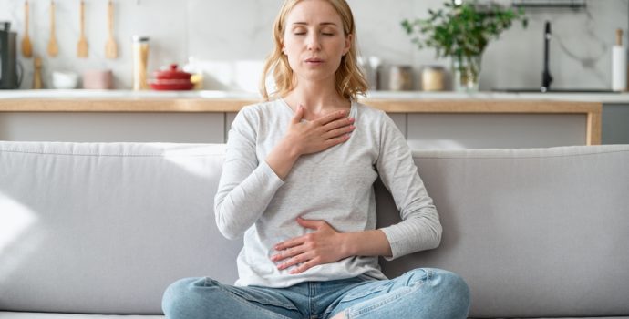 concept,of,mental,health.,woman,sitting,on,couch,and,doing