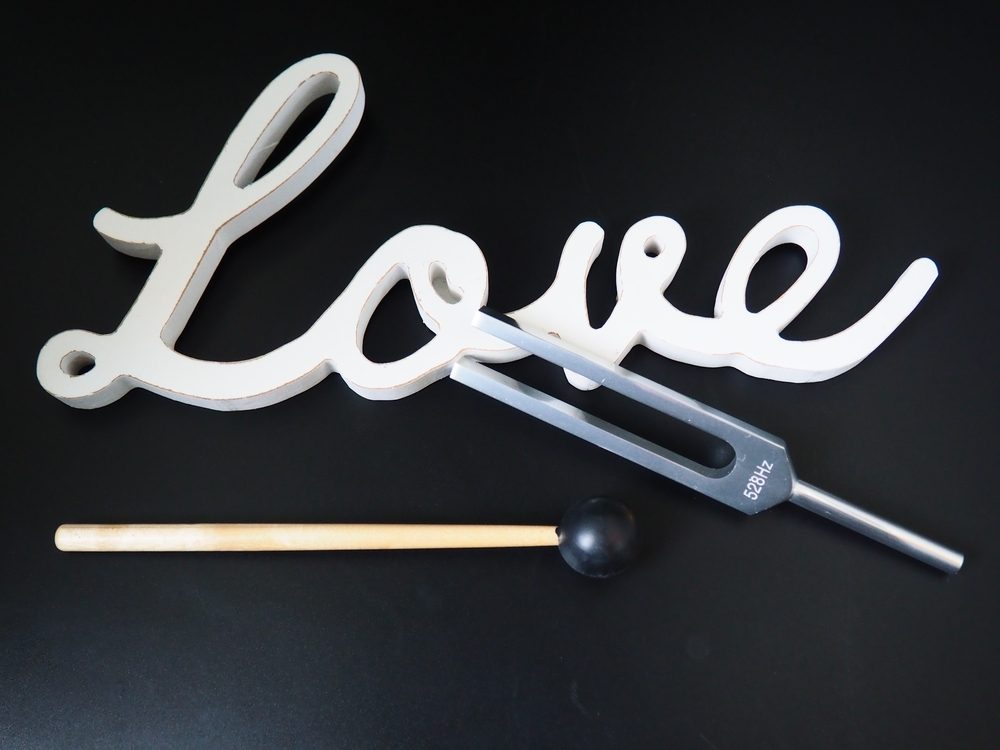 increasing,love's,frequency,528hz,tuning,fork,and,love,sign